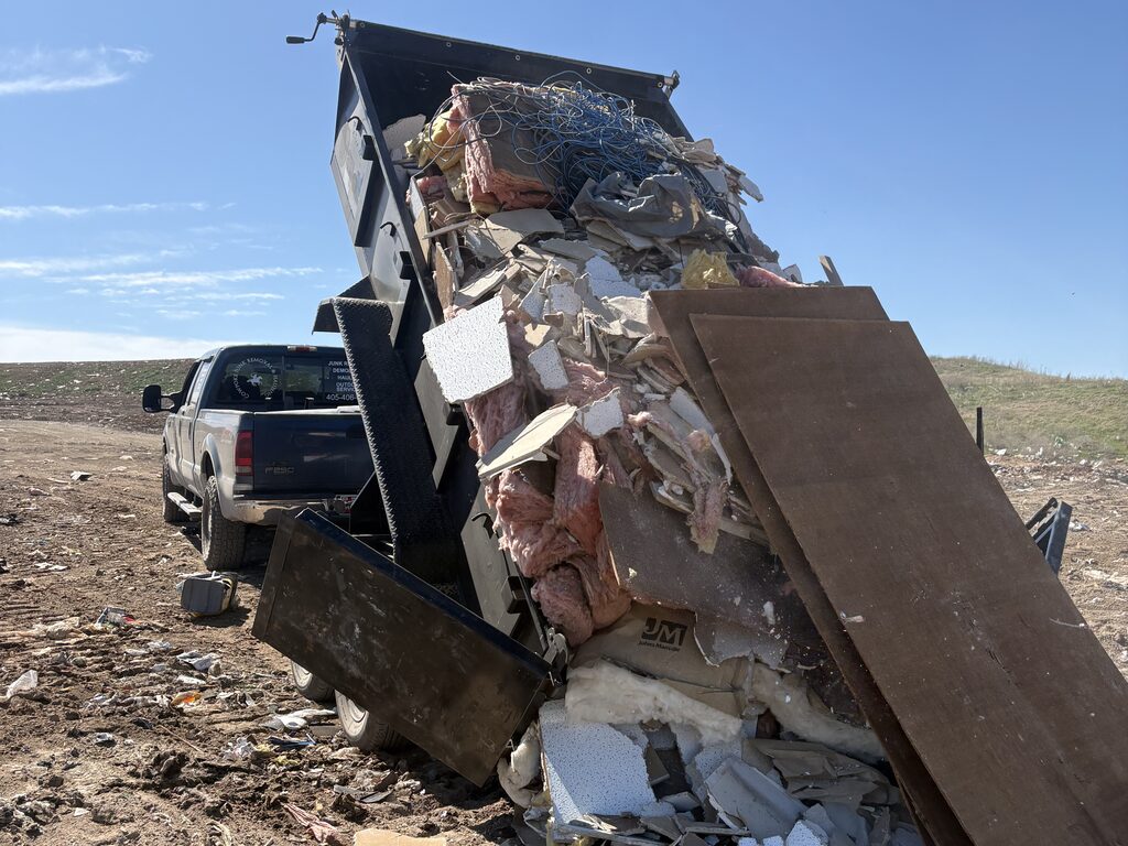 dump trailer unloading junk in Yukon OK