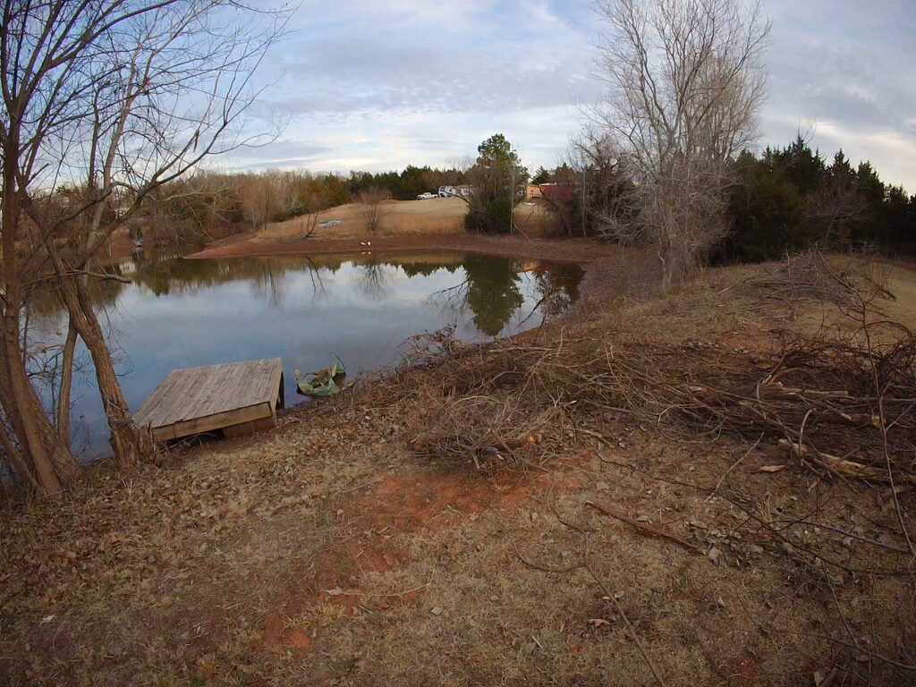 pond bank brush and limb cleanup in Oklahoma City OK