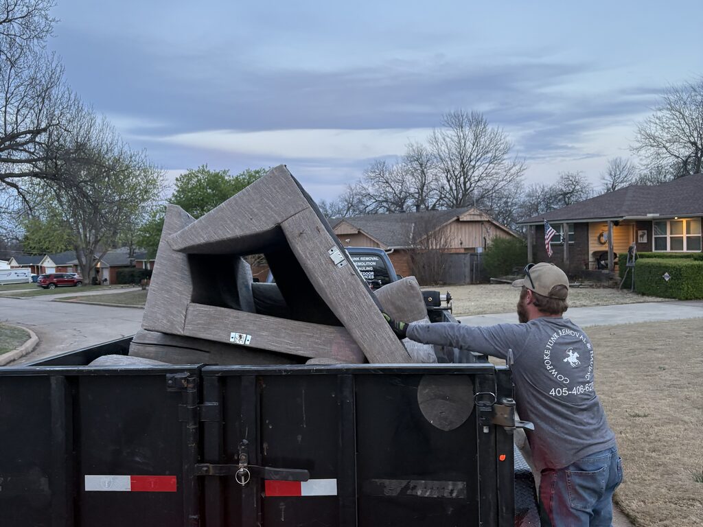 Junk removal pricing in Oklahoma City — loaded trailer with household items
